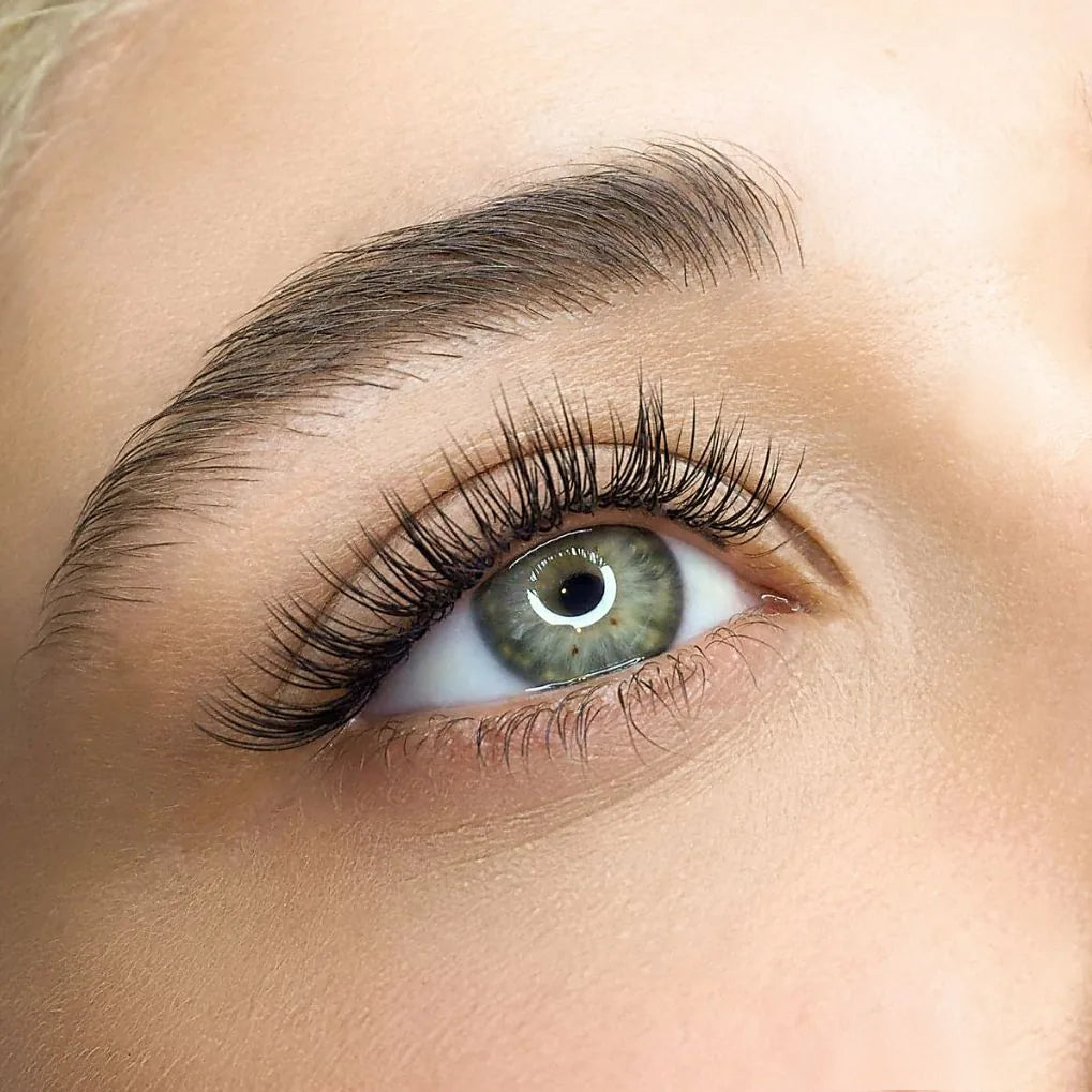 KOLYBEL Classic lash extensions deliver elegant, natural-looking definition. Applied 1:1 to your natural lashes, they create a soft, understated eye enhancement for everyday effortless beauty.