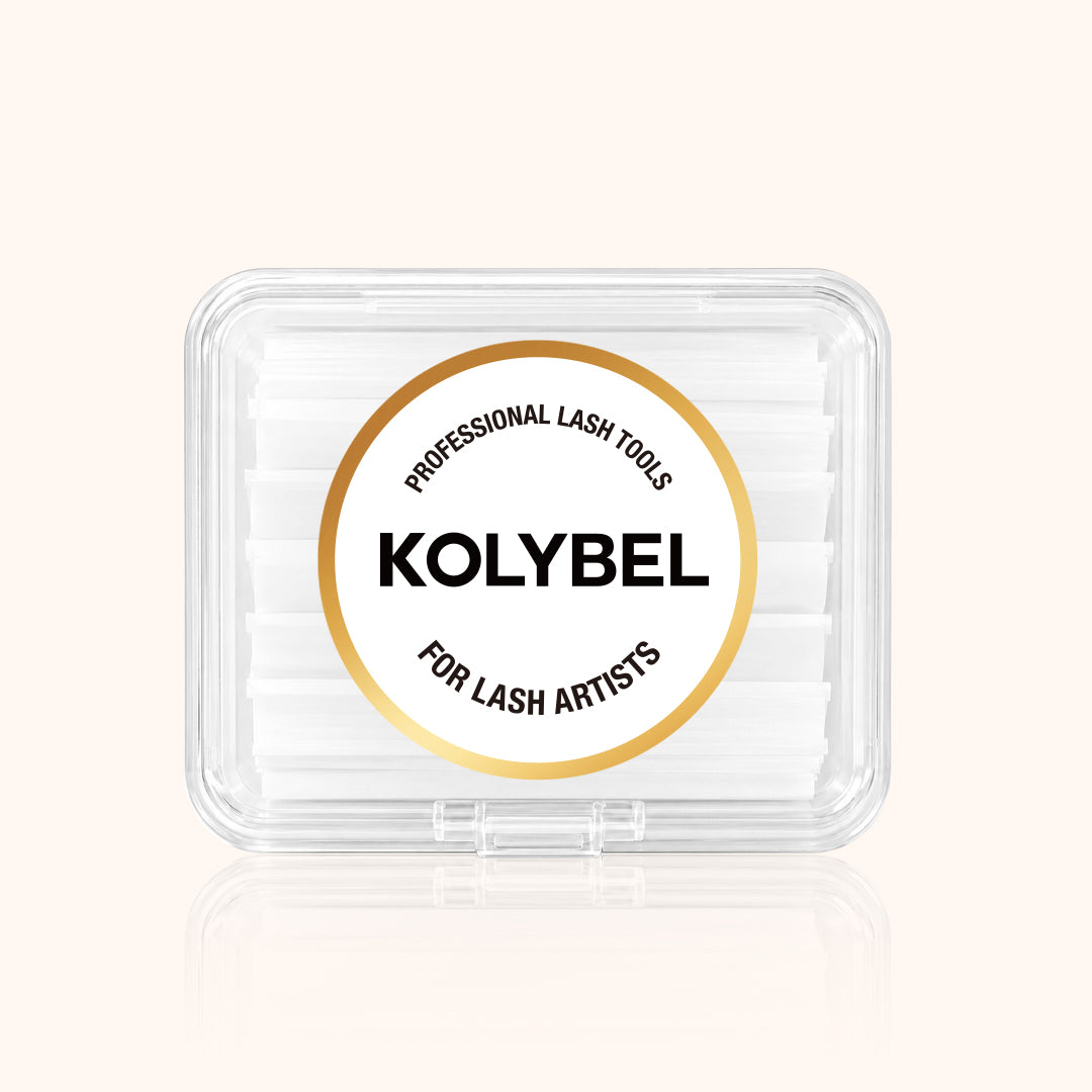 KOLYBEL LASH 500-sheet lash lift paper covers for professional use. Lint-free, pre-cut strips ensure even reagent distribution and secure lash placement