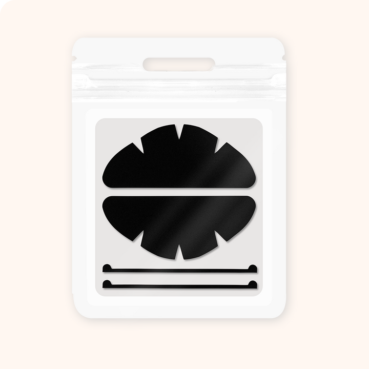 Reusable dual-use silicone lash shields with fixing strips. UV protection for lash curing + lash isolation for perm services, soft ergonomic fit for professional salon use.